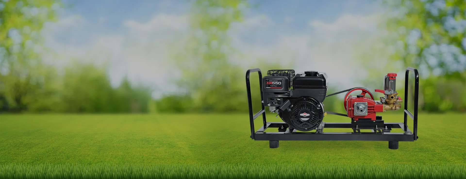 ALAP HTP sprayer unit powered by a Briggs & Stratton petrol engine, standing in a green field