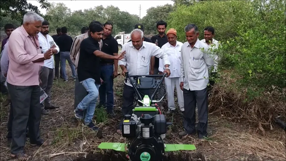 ALAP power weeder working between crop rows at Dhava village, Junagadh